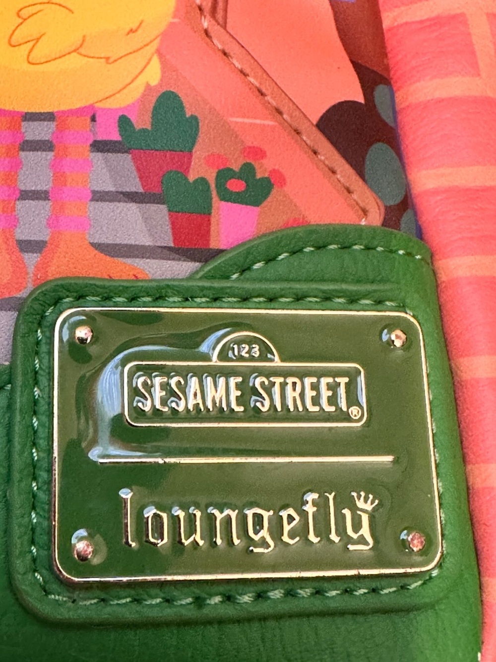 Loungefly Sesame Street Corner Building figural mini backpack featuring iconic c